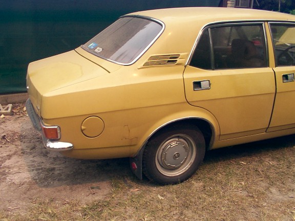 right side and back showing the scratch and damage to boot